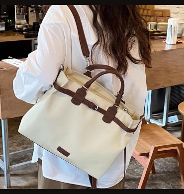 Shoulder bag for women, new niche design, large capacity multifunctional briefcase, commuting handheld crossbody bag handbag